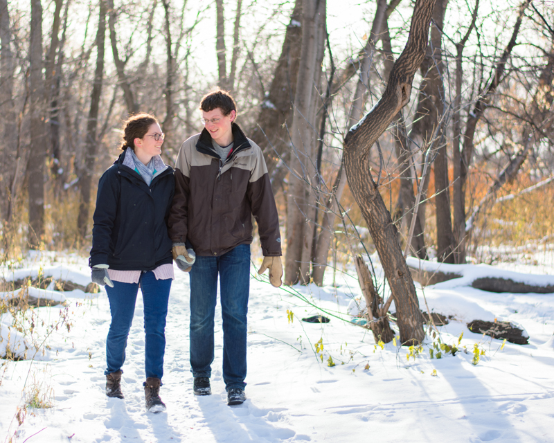 Couple walking in the snow -- engagement photos in winter -- fargo engagement photography